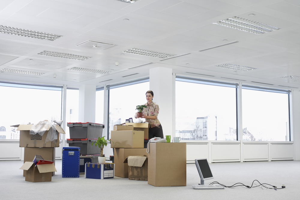 Office Relocation - Woman with Cardboard boxes