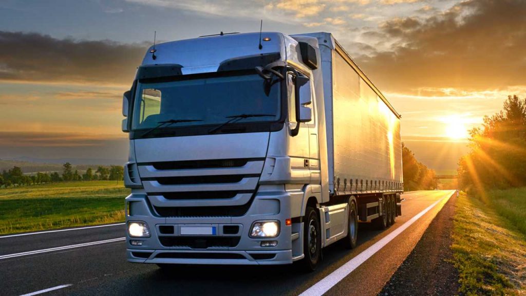 lorry driving in sunset